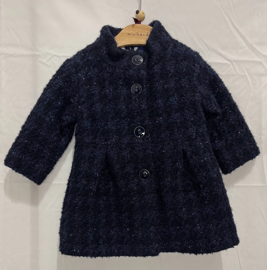 Cappotto blu con fiocco sul retro in lurex