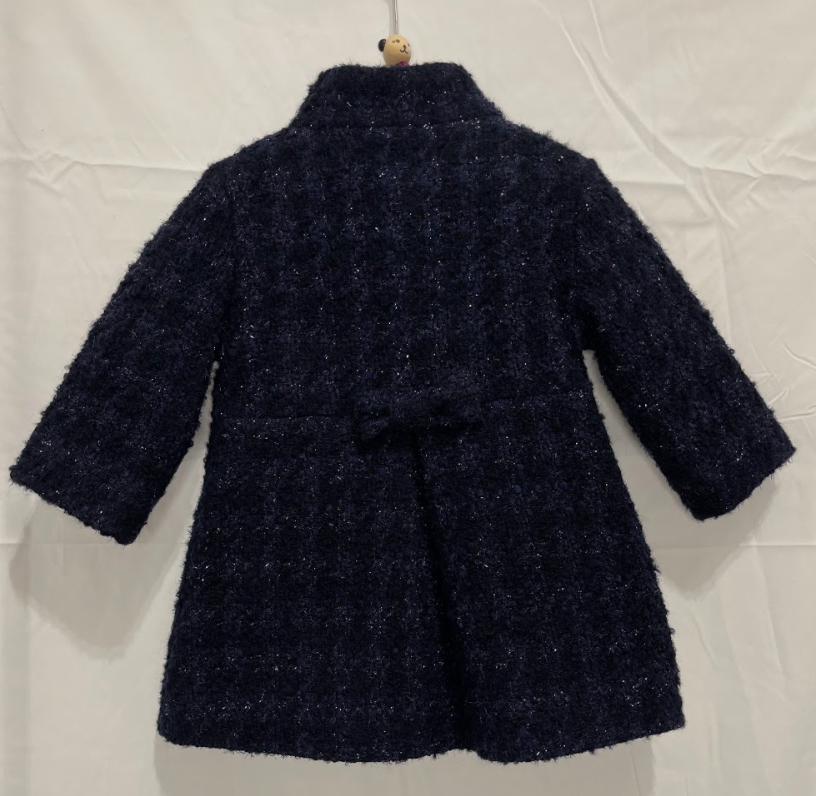 Cappotto blu con fiocco sul retro in lurex