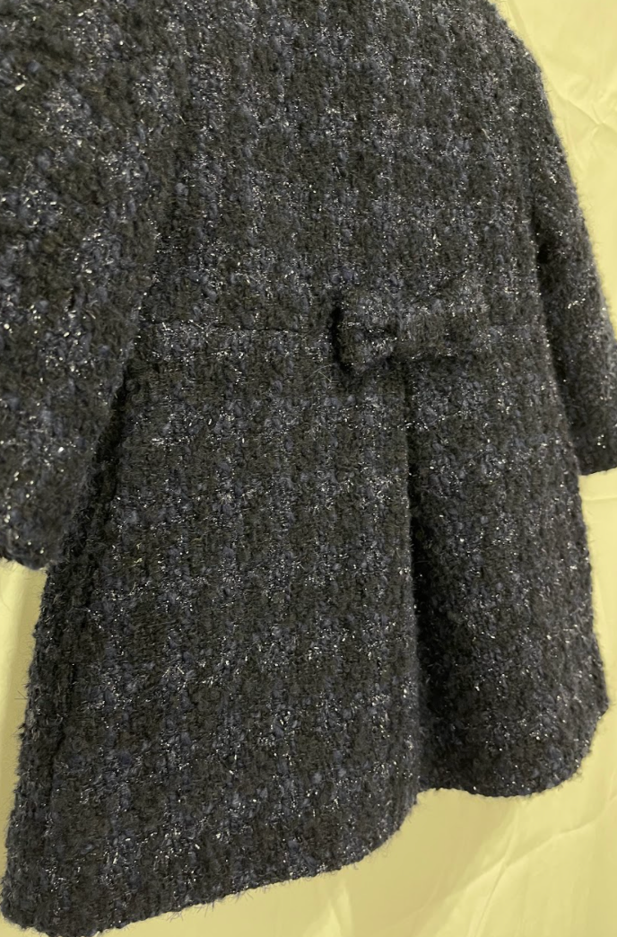 Cappotto blu con fiocco sul retro in lurex